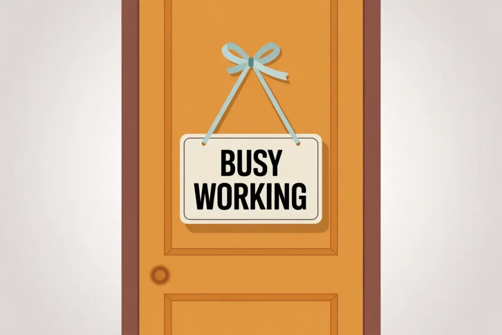 busy working sign on yellow door